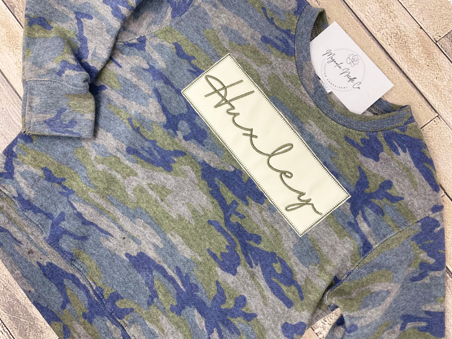 Camo sweatshirt with embroidered monogram leather patch
