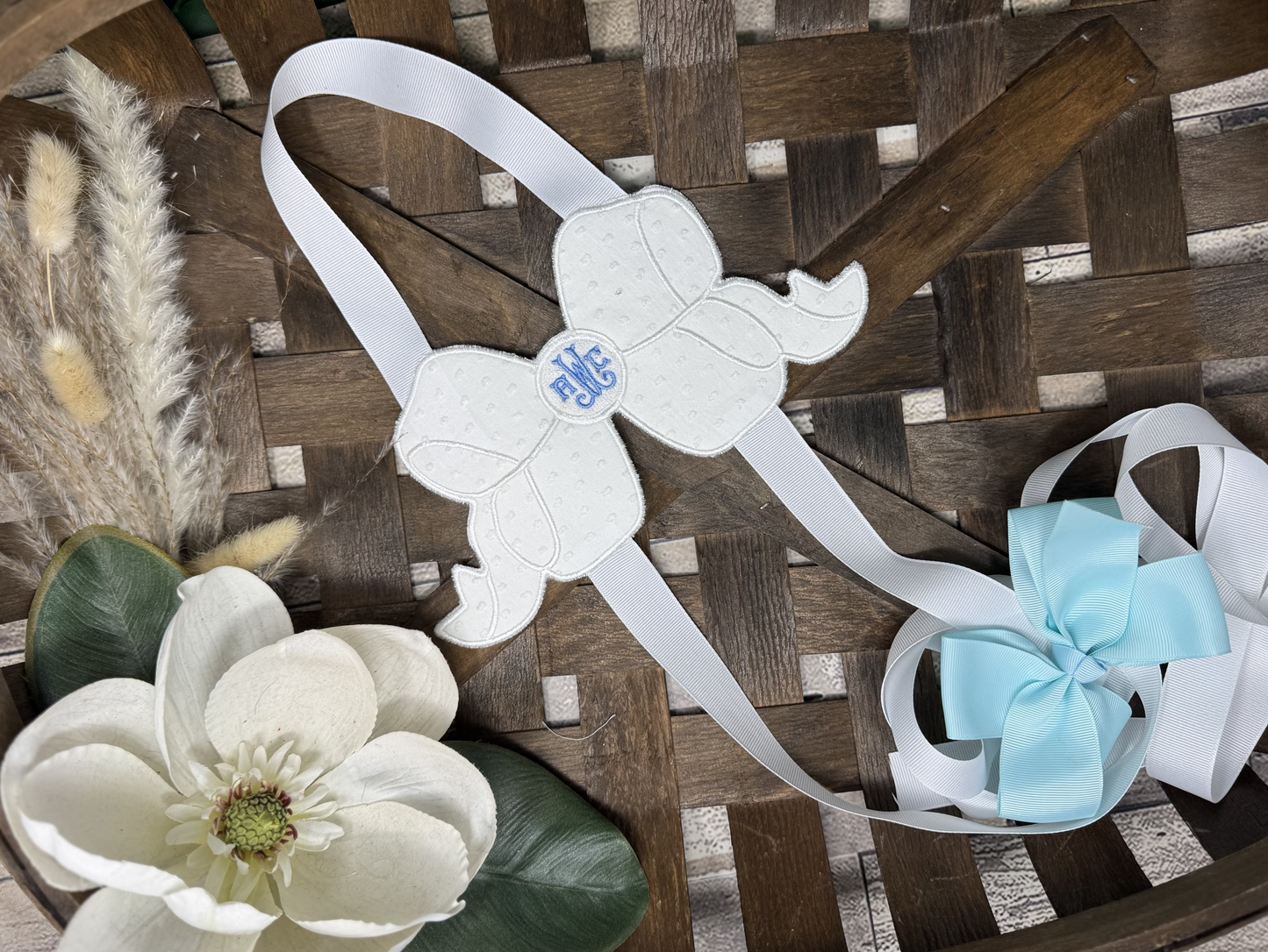 Custom embroidered bow holder