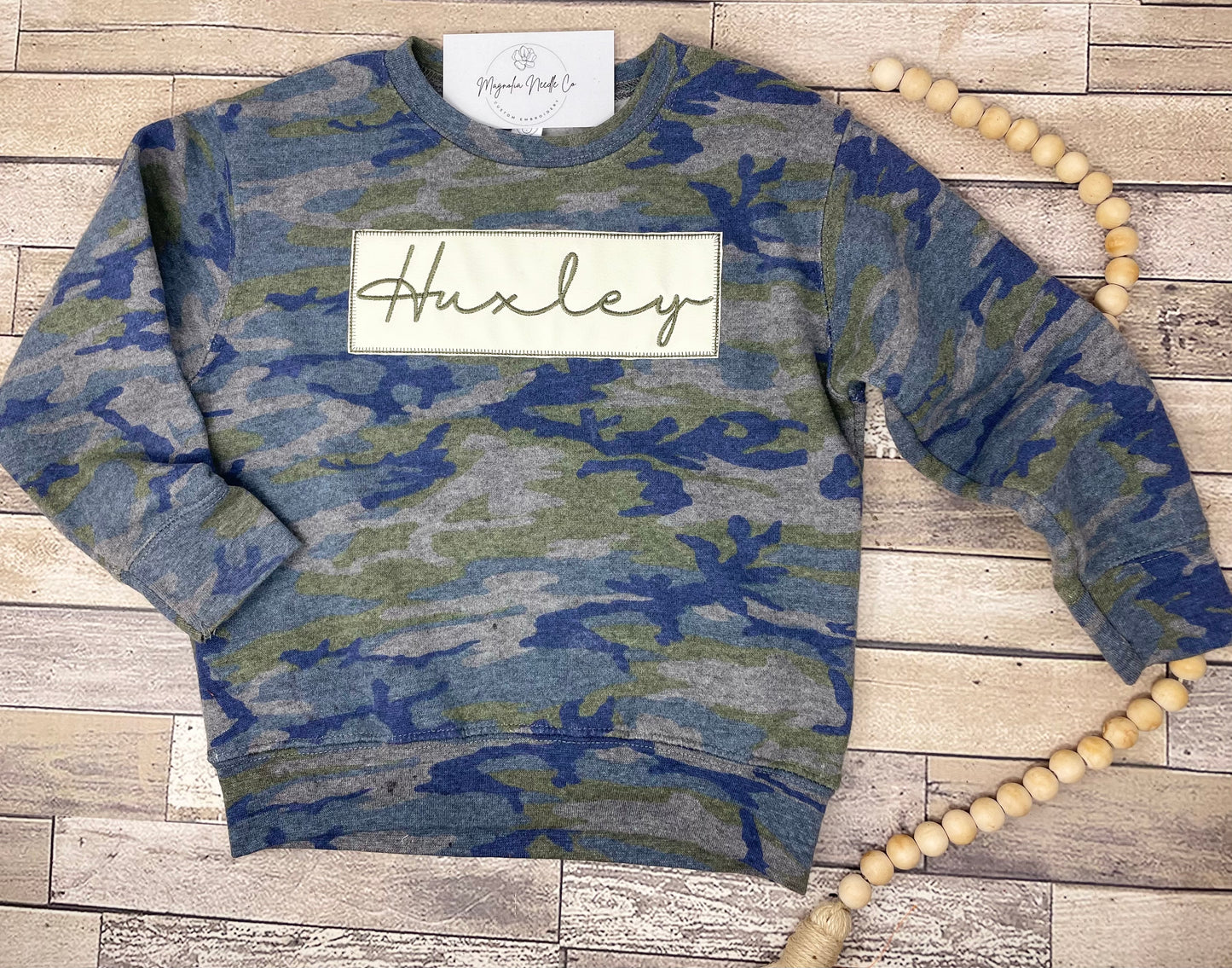 Camo sweatshirt with embroidered monogram leather patch